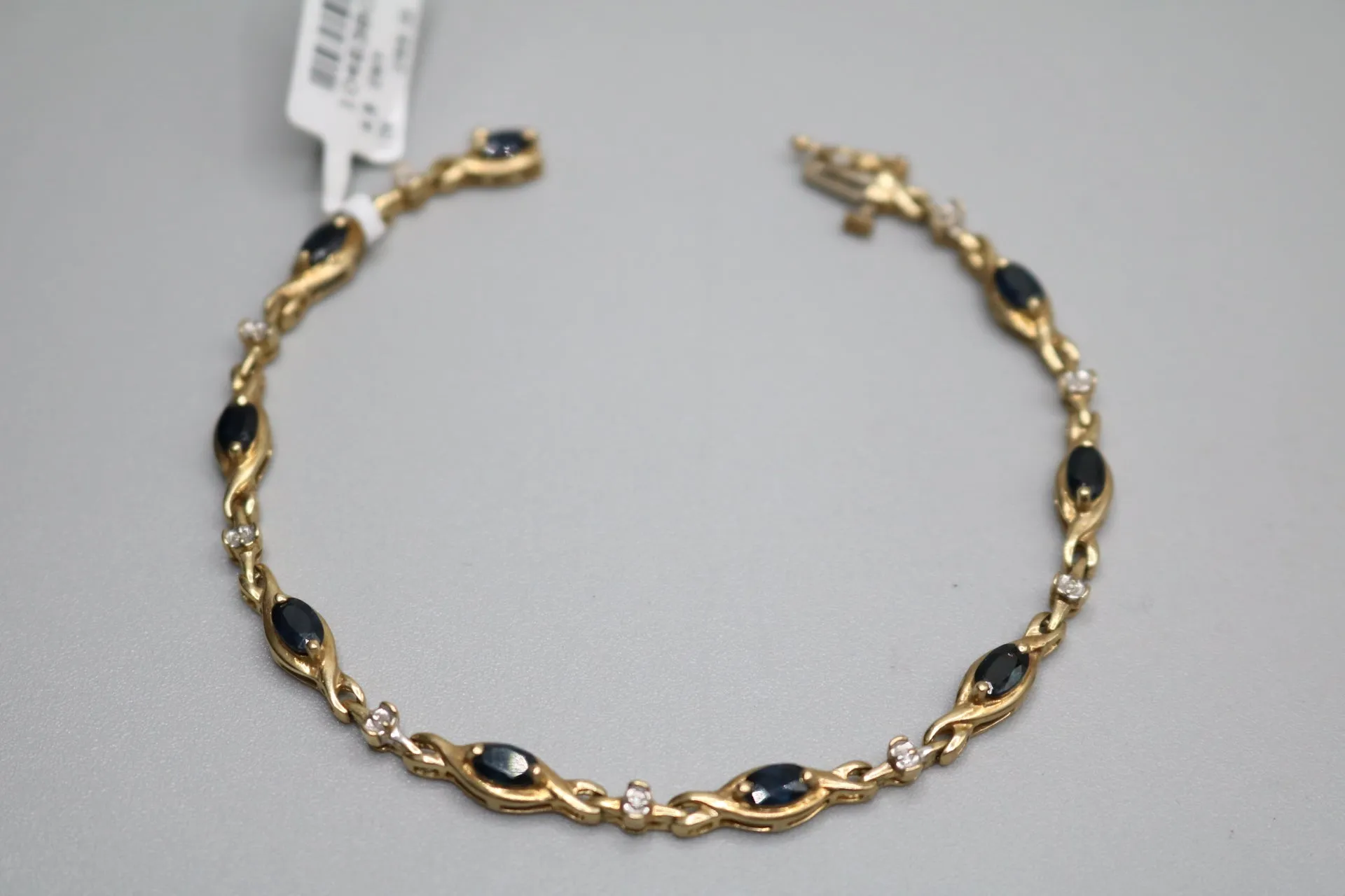 10K Yellow Gold Tennis Bracelet W/ Diamond & London Blue Topaz (7 inches)