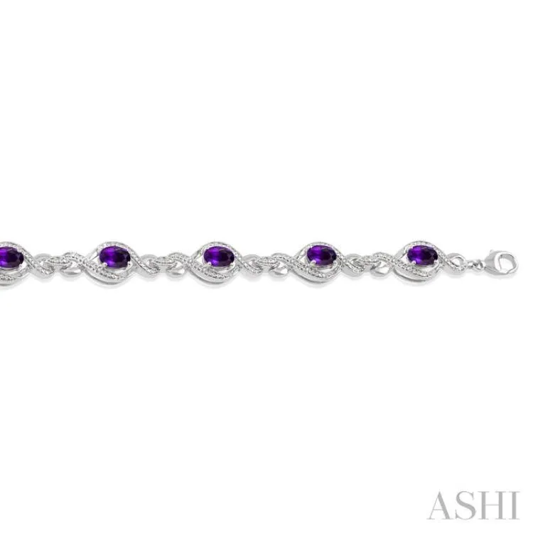 1/10 Ctw Round Cut Diamond & 7x5 MM Oval Cut Amethyst Semi Precious Bracelet in Sterling Silver