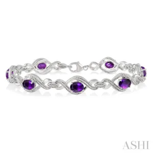 1/10 Ctw Round Cut Diamond & 7x5 MM Oval Cut Amethyst Semi Precious Bracelet in Sterling Silver