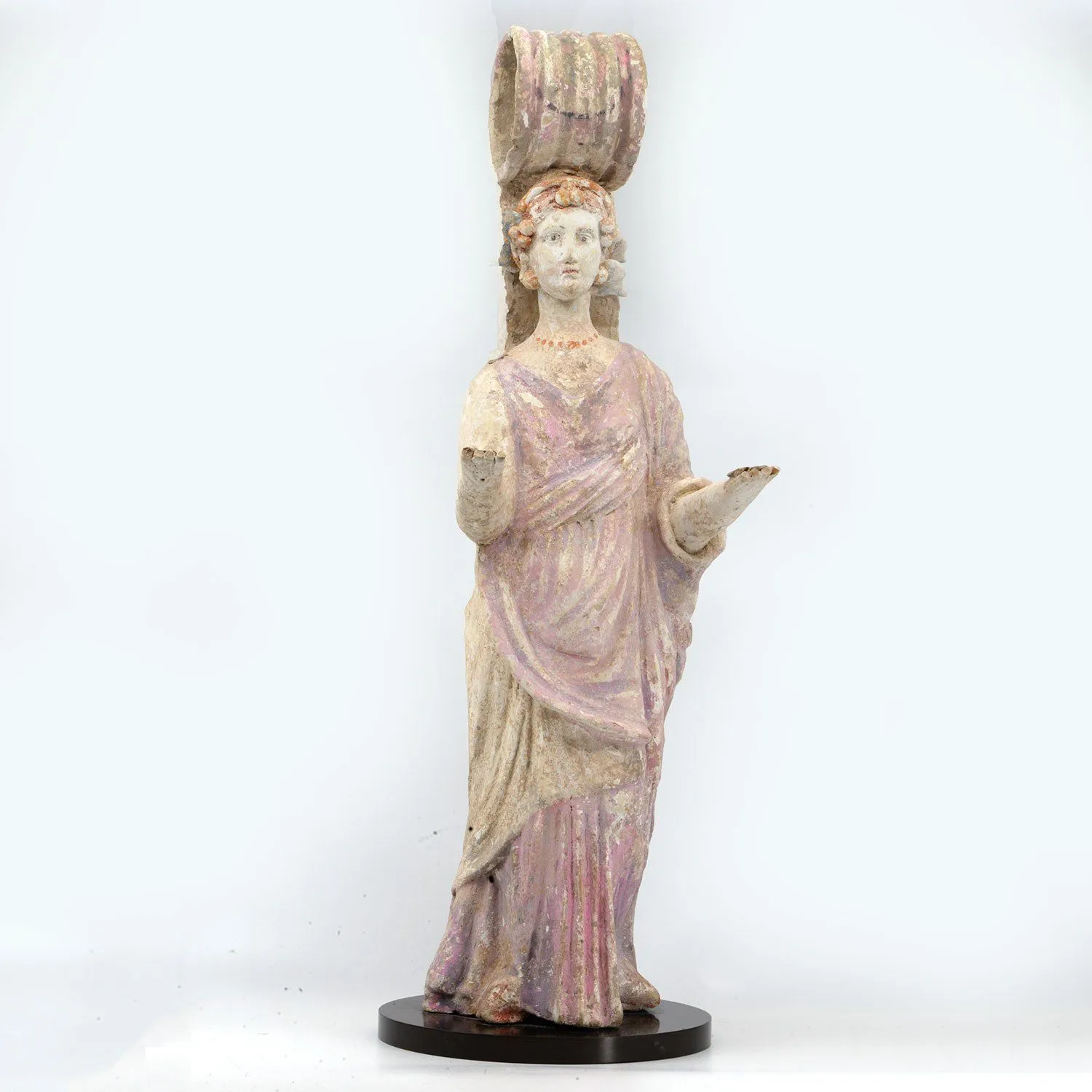 A Greek Terracotta Votive Goddess Pseudo-Vase, Late 4th century - early 3rd centuryBCE