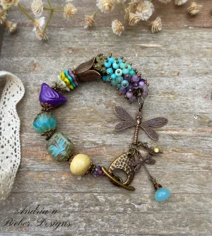 Handmade lampwork glass, purple ceramic bird, mixed stone, Czech glass, bronze metal, dragonfly charm, bracelet, jewelry