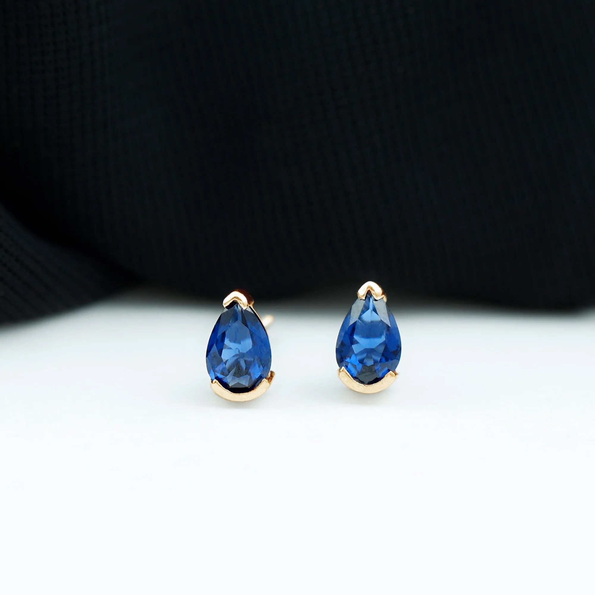 Pear Cut Lab Grown Blue Sapphire Solitaire Stud Earrings