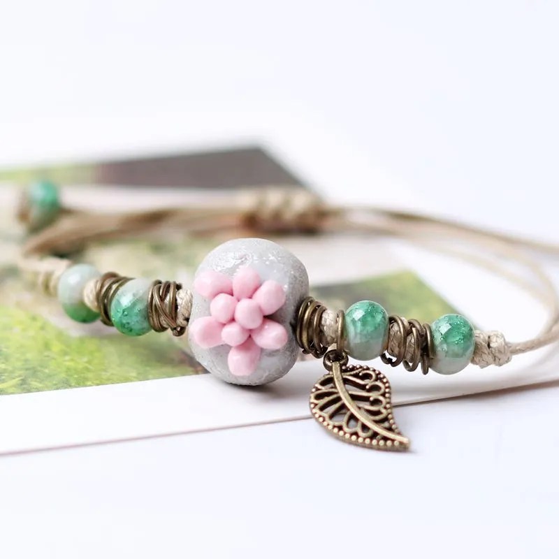 Small fresh pastoral style hand pinched four-leaf clover succulent Bracelet female summer trend female color clay bracelet beads five-color succulent flower