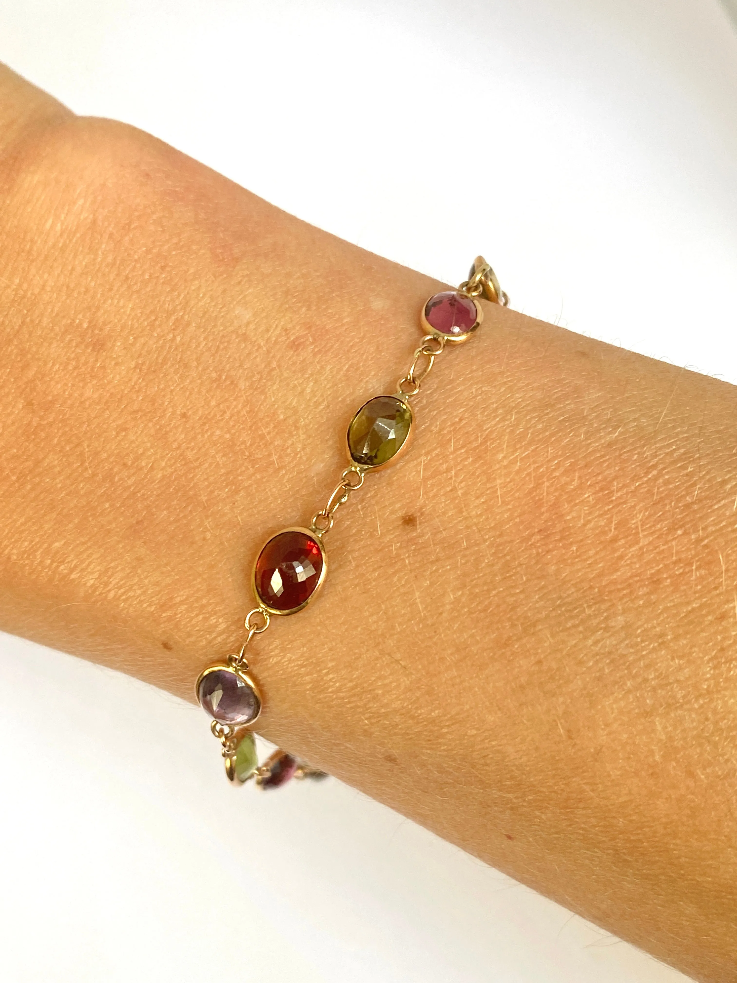 Vintage, 9ct Gold, Multi Gem Bracelet featuring, Peridot, Garnet, Amethyst, and Topaz